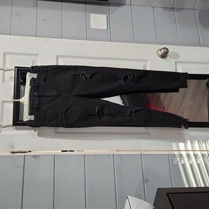American Eagle super high rise stretch jegging with destruction size 10